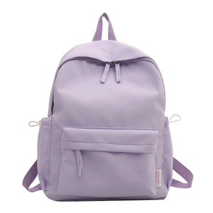 Minimalist lavender water-resistant school backpack with Fashion label on white background