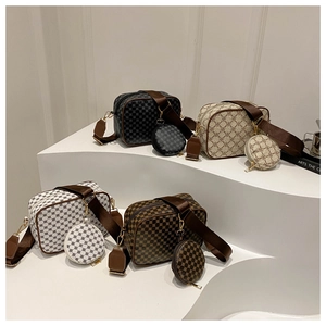 Crossbody camera bags in four colors with geometric prints and mini coin pouches