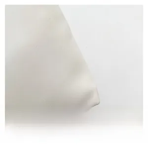 Macro shot of white pearlescent faux leather texture on minimalist shoulder bag