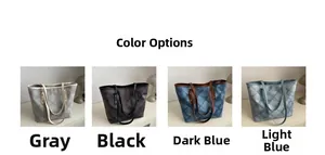 Detail view of large capacity tote bags in grey, black, dark blue and light blue denim