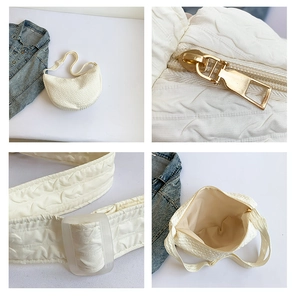 Detail view of quilted off-white crossbody bag featuring golden hardware and inner pockets