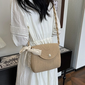 Straw flap crossbody bag with pearl button and white lace bow detail for summer