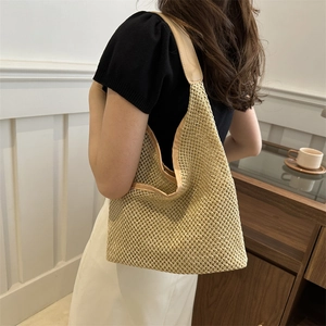 Minimalist straw woven tote bag for women with tan faux leather straps and large capacity