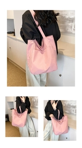 Detailed view of pink nylon tote bag with pleated texture and spacious front pocket