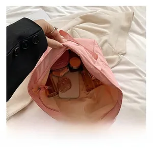 Top view of pink waterproof tote bag interior showing large storage capacity