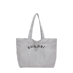 Minimalist black and white striped canvas tote bag with Summer lettering and front pocket
