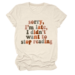 Detail of Sorry I'm Late slogan print on a beige crew neck short sleeve cotton T-shirt
