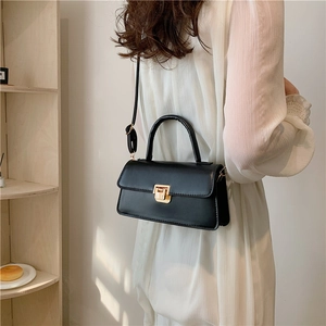 Retro black leather square crossbody bag with gold buckle and top handle for women