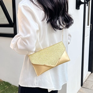 Sparkly gold sequin evening clutch bag with V-shaped envelope flap and chain strap