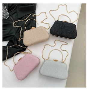 Sparkling sequin evening clutch bags in four colors with gold ring handles and crown locks