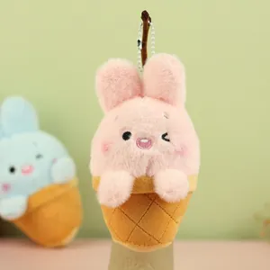 Close-up of pink rabbit ice cream plush pendant with soft texture and silver bead chain