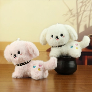 Detail of plush Cinnamoroll dog charms showing soft faux fur and embroidered features