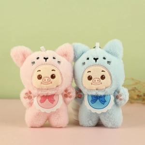 Lot de porte-clés cochon en peluche rose et bleu avec texture douce et capuche