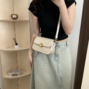 Chic beige crossbody square bag with gold lock buckle and adjustable leather shoulder strap
