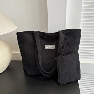 Two-piece black corduroy tote bag set with striped texture and fashion woven label