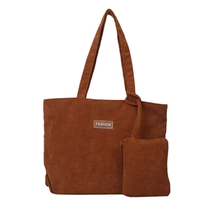 Brown striped corduroy tote bag with mini pouch and Fashion label on white background