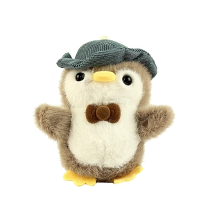 Cute penguin plush toy with gray knit hat and brown bowtie on white background
