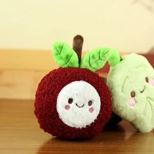 Close-up of cute plush lychee fruit pendant with detailed embroidery and soft texture