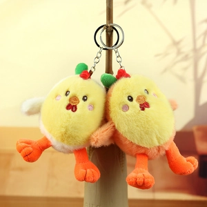 Close-up of cute plush yellow chick keychains with soft texture and metal rings