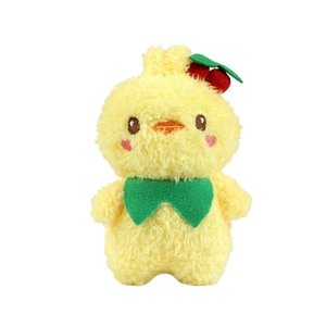 Cute yellow plush duckling keychain with green bow and cherry decor on white background