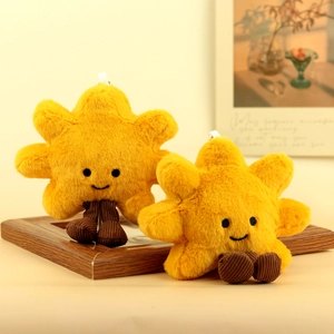Macro detail of plush sun flower pendant with soft yellow fur and corduroy legs