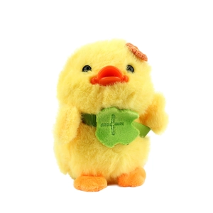 Portachiavi papera di peluche gialla con quadrifoglio verde e fiore arancione decorativo