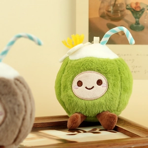 Dettaglio portachiavi in peluche a forma di cocco verde con cannuccia a righe e fiore