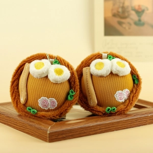 Close-up of cute ramen bowl plush keychain with detailed embroidery and soft texture