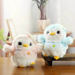 Cute penguin plush keychains in pink and blue lace dresses for bags and gifts