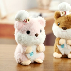 Close-up of cute plush hamster chef dolls featuring soft pink fur and a white chef hat