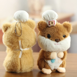 Detailed plush texture of cute hamster chef keychains on a wooden table with soft lighting