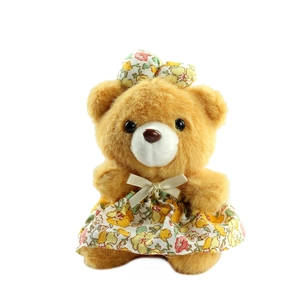 Porte-clés ours en peluche marron avec robe à fleurs jaunes et doubles nœuds