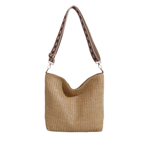 Sac fourre-tout en paille avec bandoulière géométrique et design minimaliste