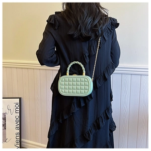 French style mint green quilted box bag with woven handle and gold chain strap