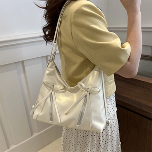 Creamy white PU leather tote bag with elegant bows and decorative silver zippers