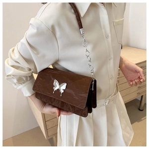 Elegant dark brown chain shoulder bag with silver butterfly buckle and crinkled texture