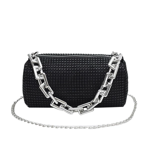 Sparkling black rhinestone cylinder handbag with industrial silver square chain strap
