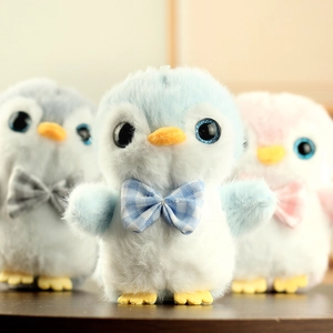 Détails de peluches pingouins mignons avec fourrure douce et nœuds papillon décoratifs