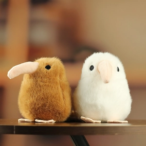 Cute plush kiwi bird keychain in brown and white colors, soft stuffed animal toy