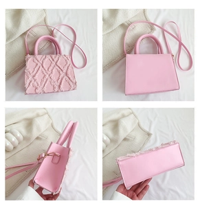 Detailed views of pink quilted crossbody bag with tassel texture and gold hardware