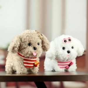 Close-up of cute plush dog keychains with striped scarves on a rustic wooden surface