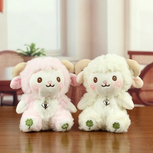 Plush sheep keychains in pink and white with heart pendants and pearl necklaces