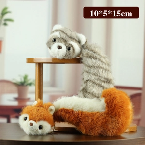 Lying red panda and raccoon plush keychains on a wooden stand, size 10x5x15cm