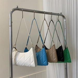 Quilted crossbody bag collection in five vibrant colors with elegant gold hardware