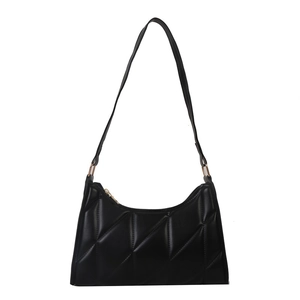 Chic black quilted hobo bag with gold hardware and elegant diamond stitching pattern