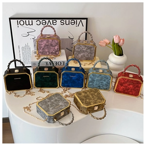 Collection of colorful marble textured octagonal crossbody bags with gold hardware details
