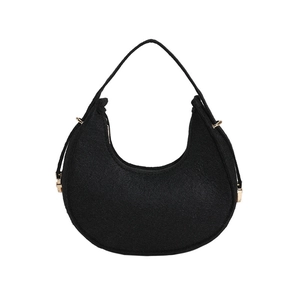 Fashionable black felt hobo shoulder bag with crescent shape and gold metal accents