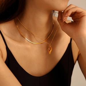 Layered 18k gold plated snake chain necklace set with conch shell and pearl pendant