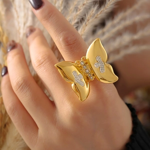 Exaggerated butterfly ring in gold PVD stainless steel with diamond butterfly wings
