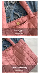 Detailed macro view of pink quilted tote bag showing strong magnetic closure and stitching